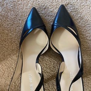 Size 8 NineWest Black leather pointy toed sling backs. New never worn
